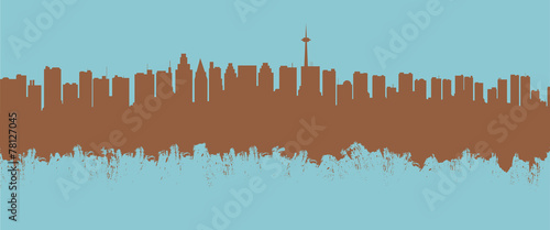 The city contour executed by a brush on a blue background.
