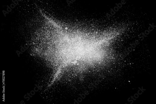 Freeze motion of white powder exploding shatter splatter