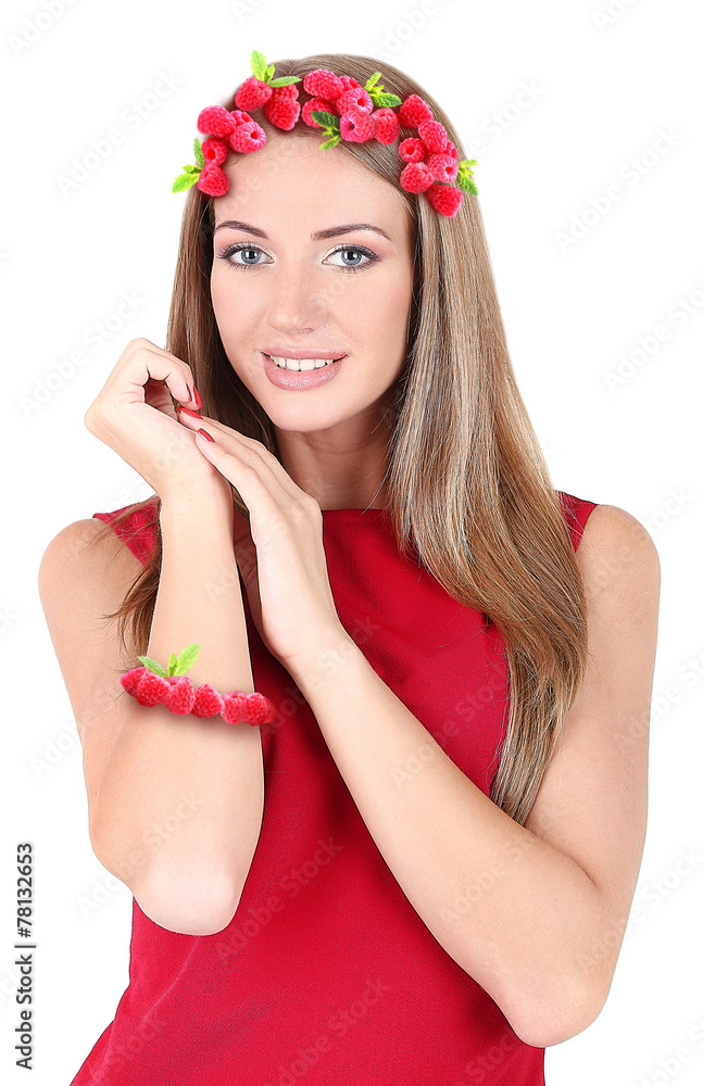 Beautiful young woman with raspberries in hair isolated on