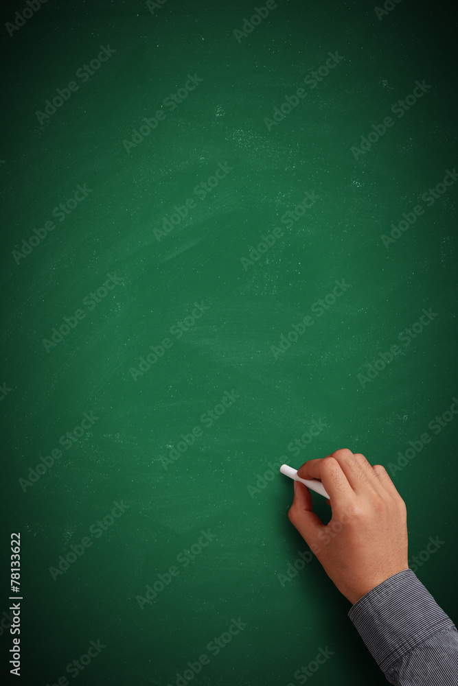 Hand writing on blank green chalkboard Hand writing on blank green chalkboard