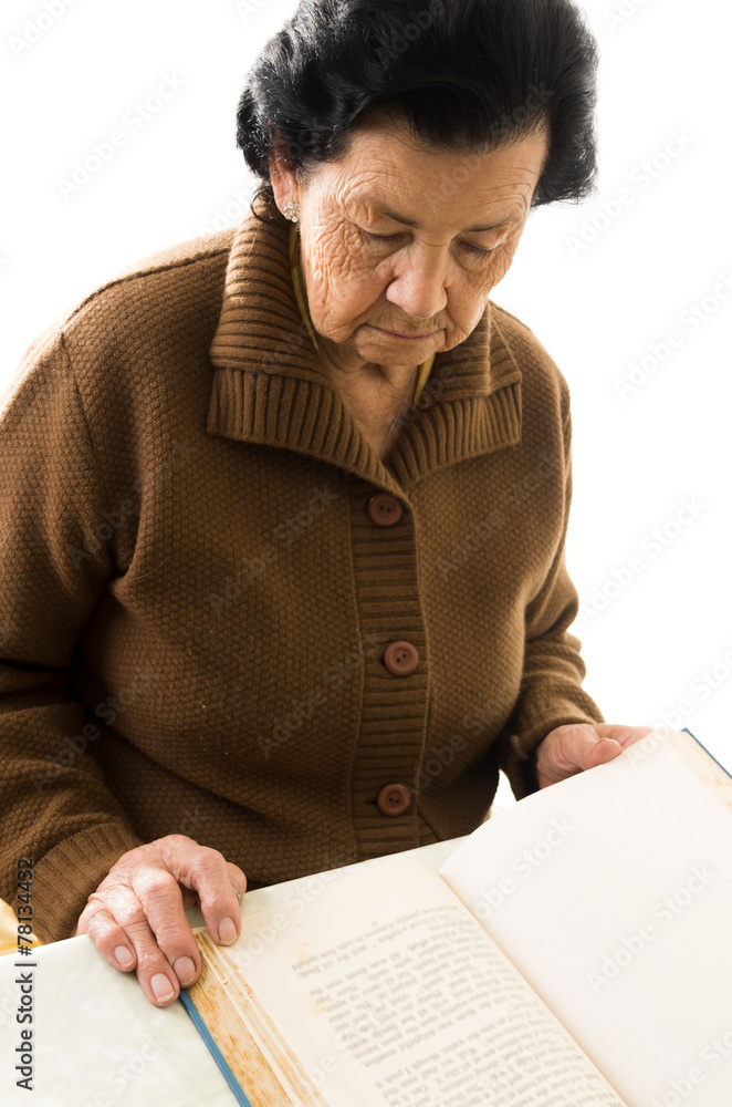 portrait of beautiful grandmother reading a book portrait of beautiful grandmother reading a book