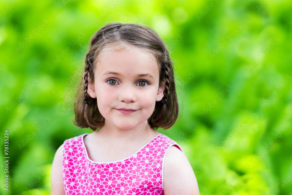 Smiling Young Girl Outside in a Summer Dress Smiling Young Girl Outside in a Summer Dress