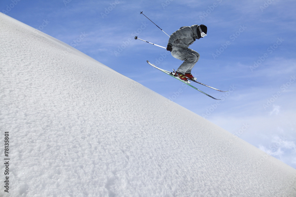 Flying skier on mountains Flying skier on mountains