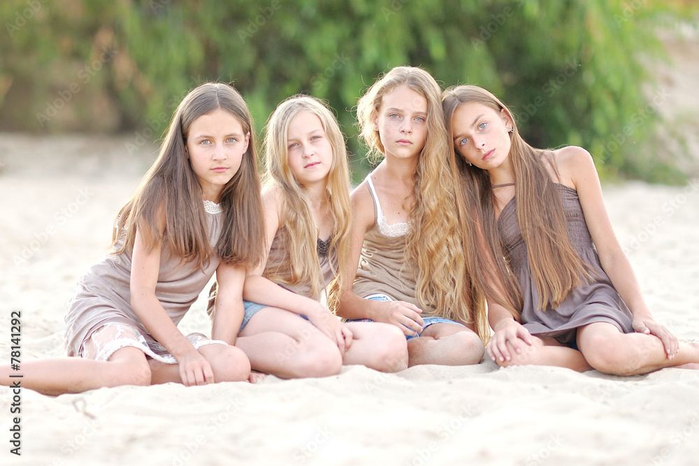 Portrait of children on the beach in summer Portrait of children on the beach in summer