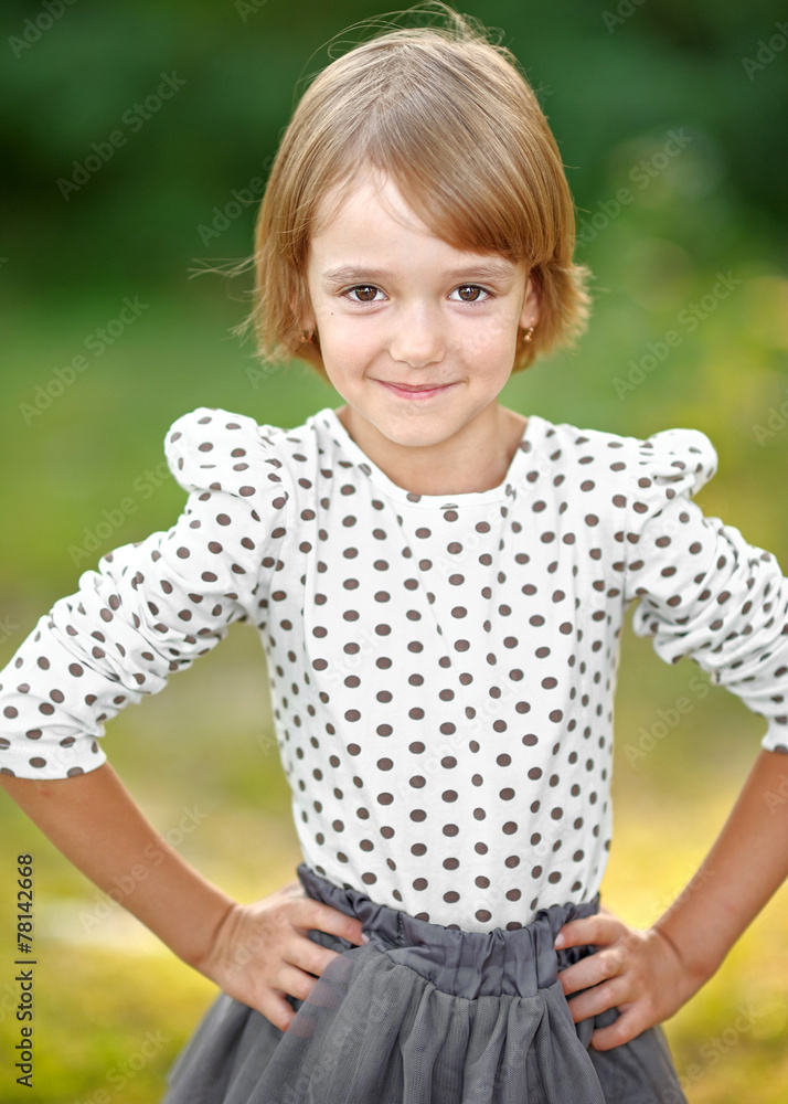 portrait of little girl outdoors in summer portrait of little girl outdoors in summer