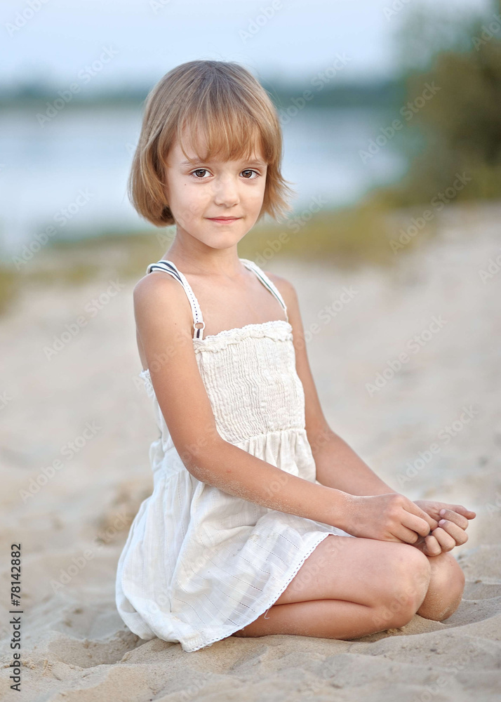 portrait of little girl outdoors in summer Stock Photo | Adobe Stock