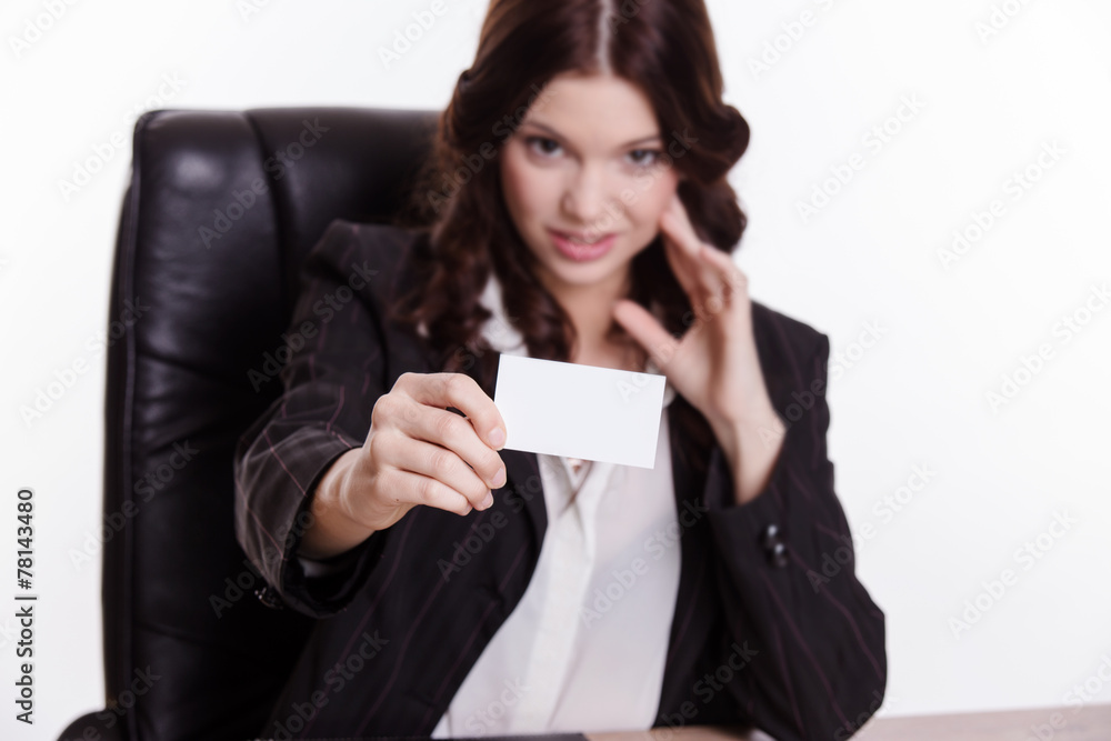 Elegant business woman shows the business card in the office Elegant business woman shows the business card in the office