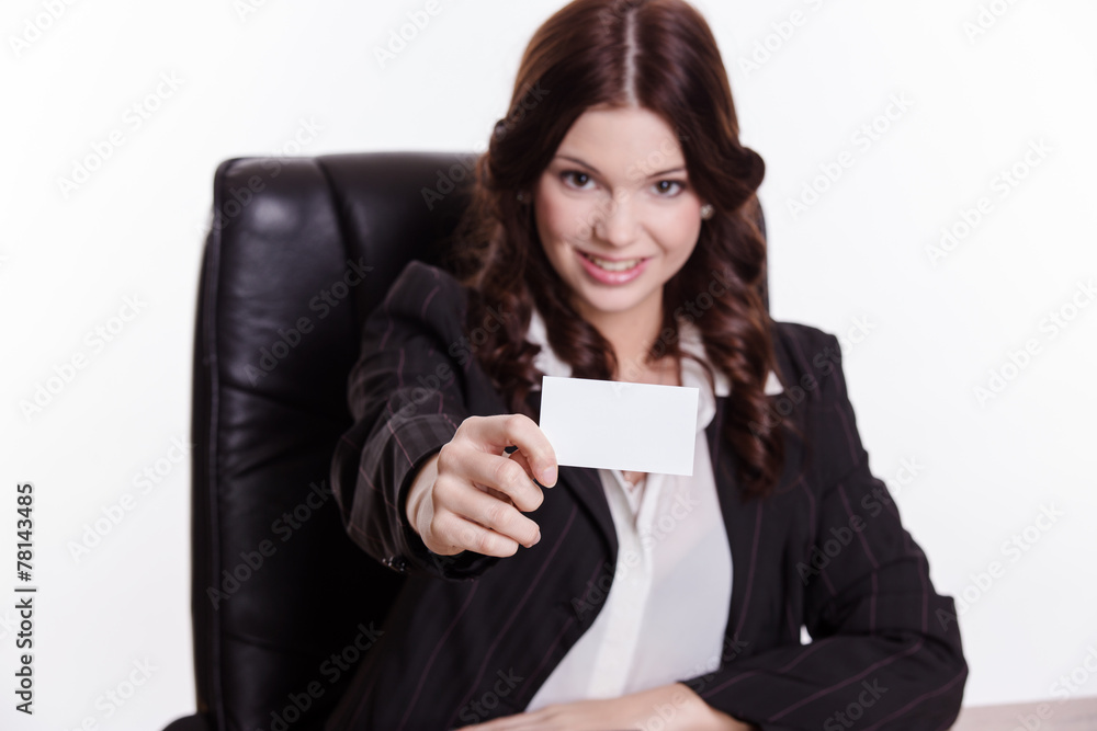 Elegant business woman shows the business card in the office Elegant business woman shows the business card in the office