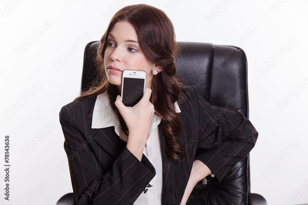 Elegant business woman with mobile phone in the office Elegant business woman with mobile phone in the office
