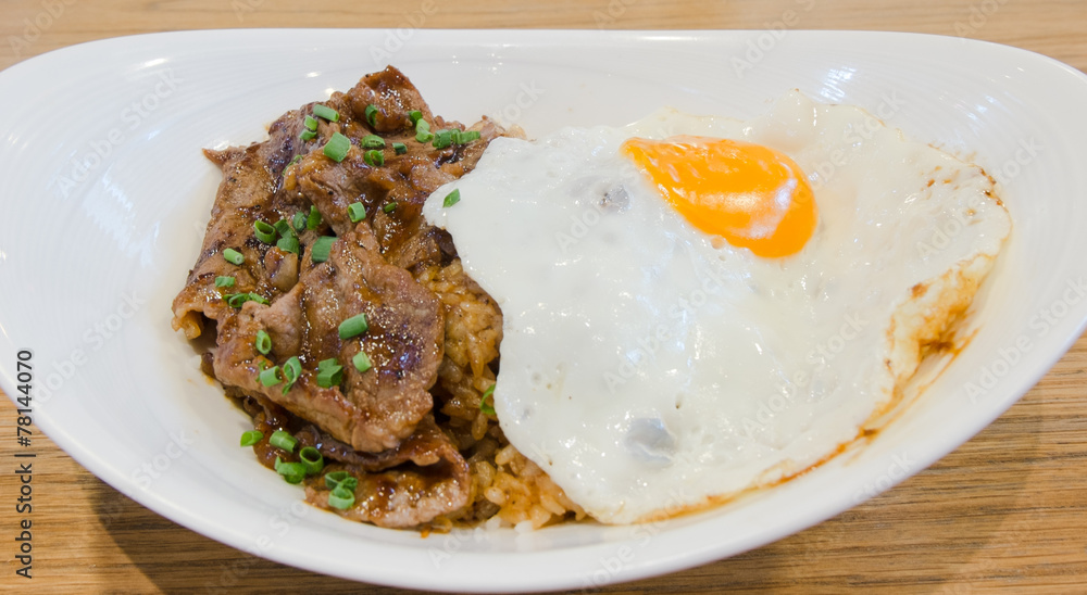 Rice with roast beef barbecue sauce and fried egg Rice with roast beef barbecue sauce and fried egg