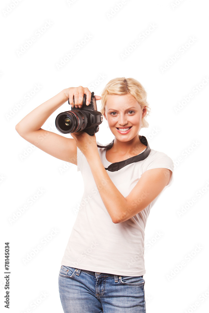 Smiling woman with photo camera, isolated on white background Smiling woman with photo camera, isolated on white background
