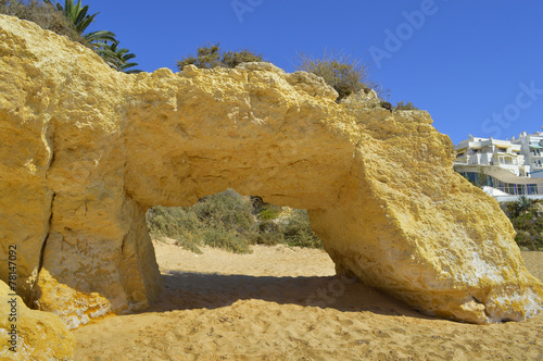 Natural stone arch on Armacao De Pera Beach