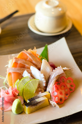 A colorful platter of sashimi sushi