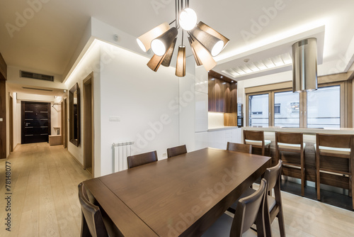 Dining room interior in modern bright apartment
