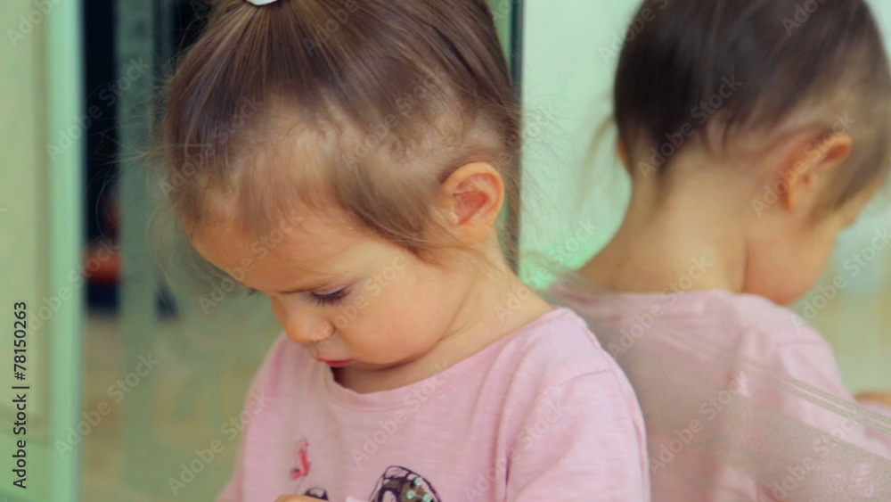 Portrait caucasian, little girl playing at home. Portrait caucasian, little girl playing at home.