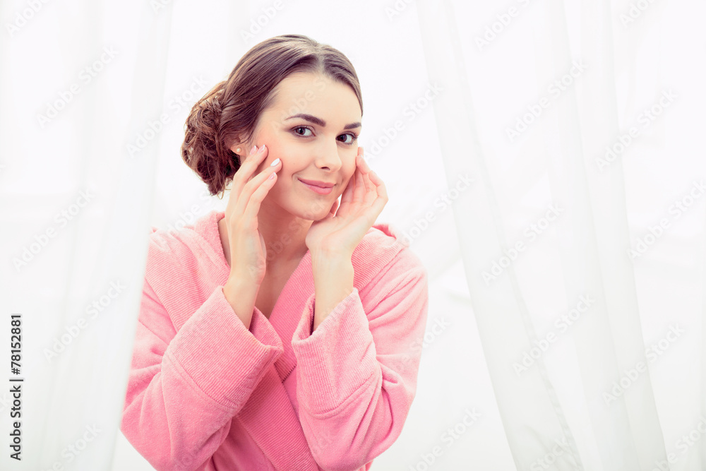 Beautiful young woman getting ready to take a bath Beautiful young woman getting ready to take a bath