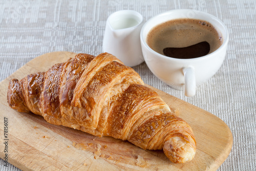 Coffee, milk and croissant. Breakfast.