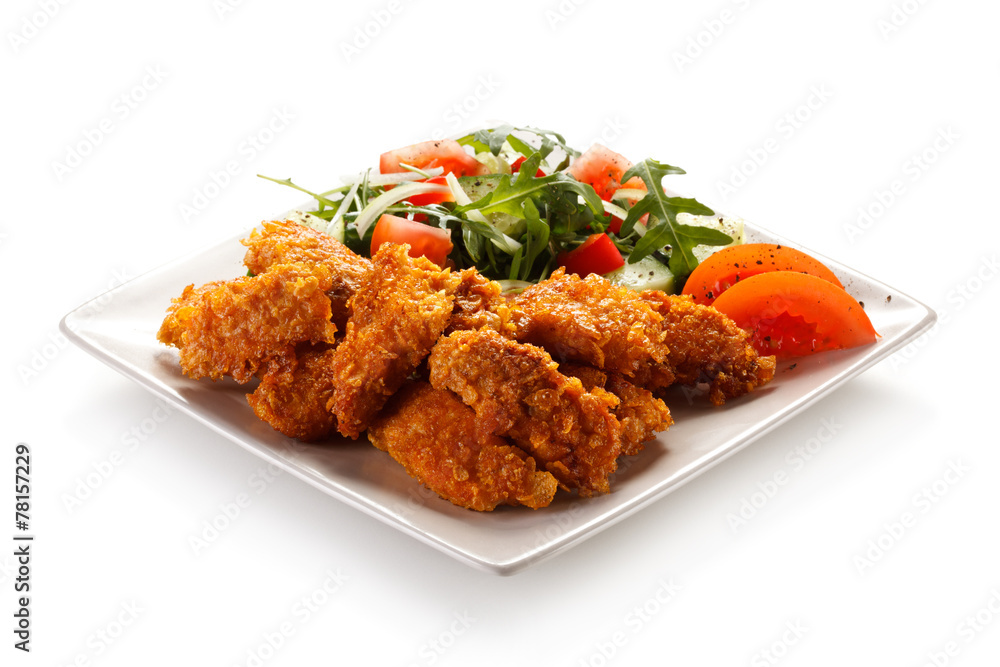 Fried chicken nuggets and vegetables Fried chicken nuggets and vegetables