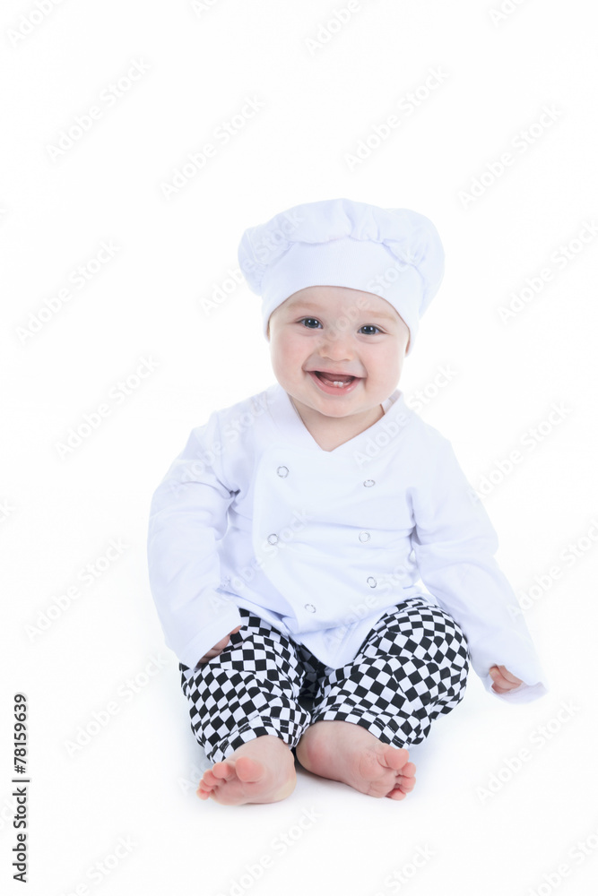 Cute little cook boy in front of a white background Cute little cook boy in front of a white background