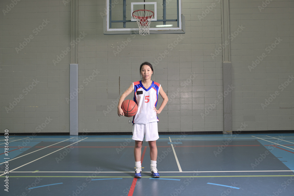 A asian basketball player in gymnase field A asian basketball player in gymnase field