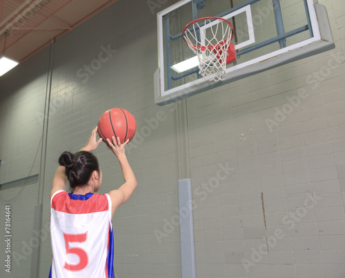 A asian basketball player in gymnase field © Louis-Photo