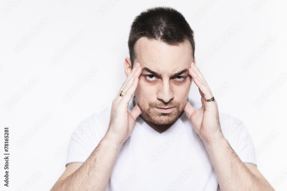 A man with a headache problem over white A man with a headache problem over white