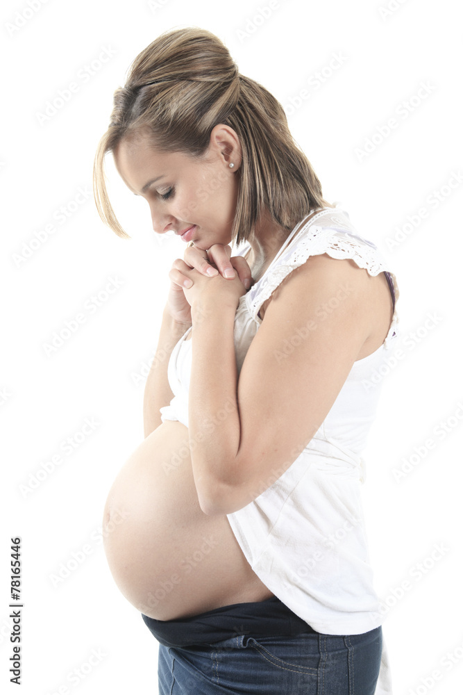 Young pregnant woman against white background Young pregnant woman against white background
