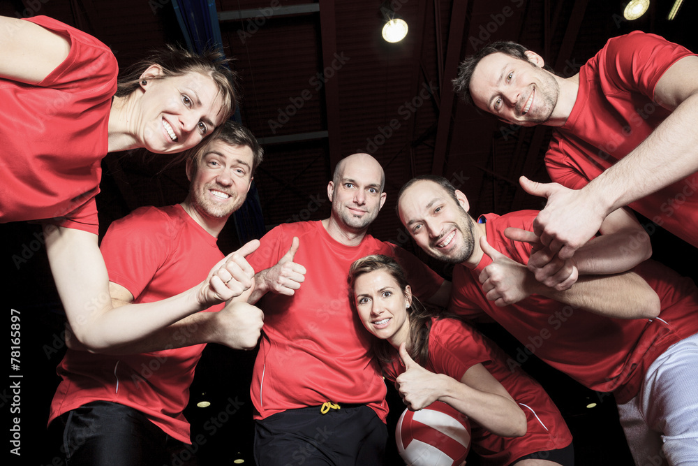A big team of volleyball wearing in red A big team of volleyball wearing in red