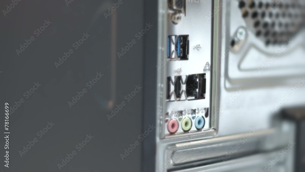 Man plug and unplug Lan Network cable in desktop PC Man plug and unplug Lan Network cable in desktop PC
