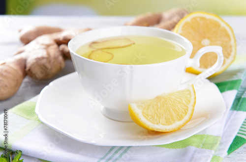 Ginger tea with lemon on table close-up