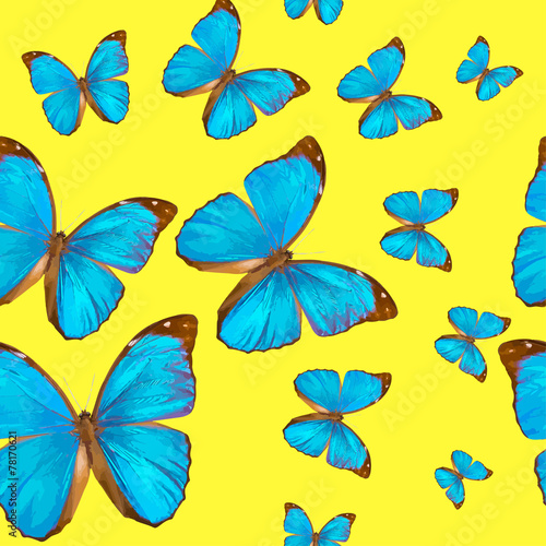 blue butterfly on yellow background pattern © Olvita