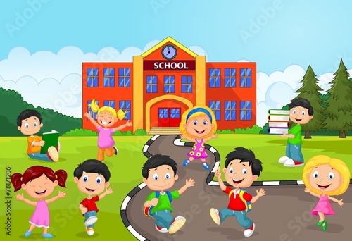 Happy school children in front of school