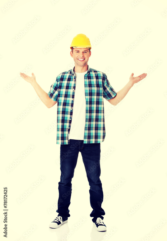 Happy worker presenting copy space. Happy worker presenting copy space.