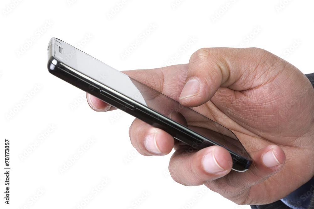 Man sending or receiving sms on his smart phone Man sending or receiving sms on his smart phone