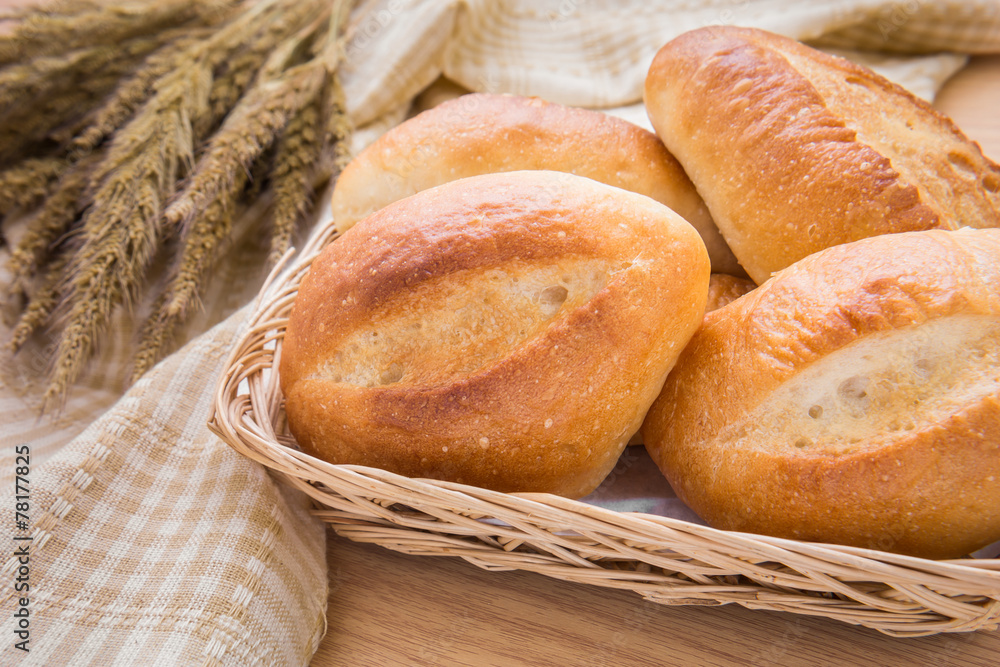 Baguette or bread in wicker basket