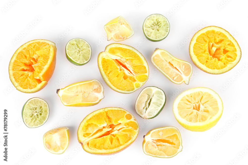 Squeezed citrus fruits isolated on white Squeezed citrus fruits isolated on white