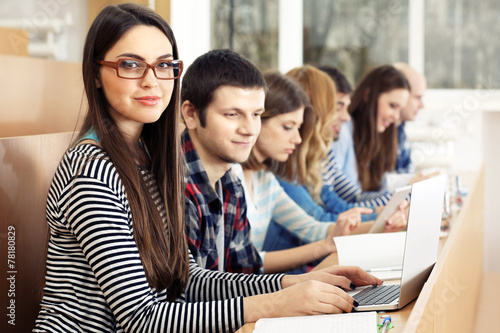 Group of students using gad...