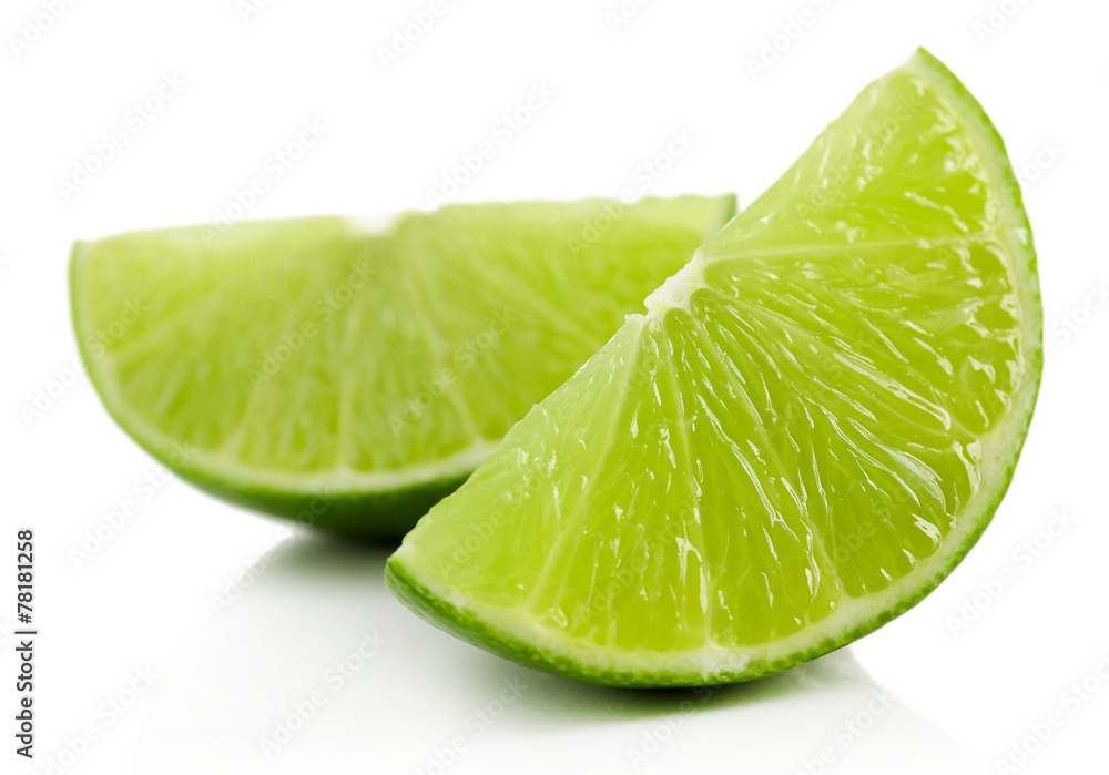 Juicy slices of lime isolated on white Juicy slices of lime isolated on white