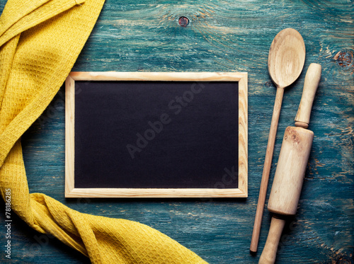 Yellow towel, wooden spoon, rolling pin