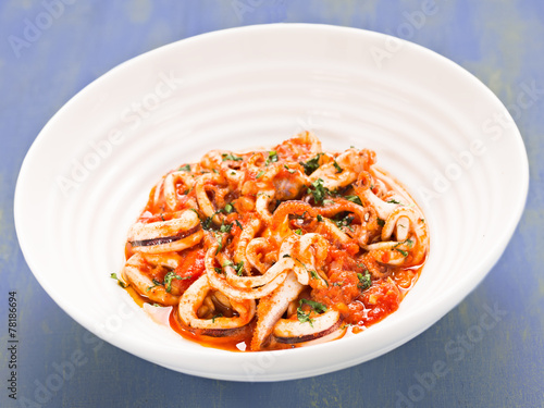 rustic italian calamari in spicy tomato sauce