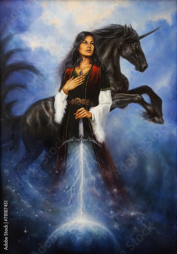 Woman with mighty black unicorn Fototapet
