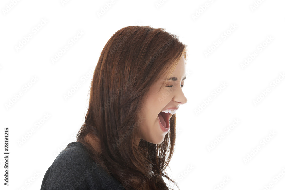 Frustrated and angry woman screaming.