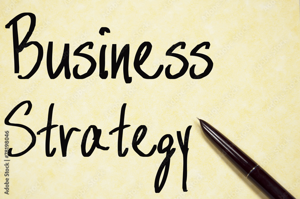 business strategy text write on paper business strategy text write on paper