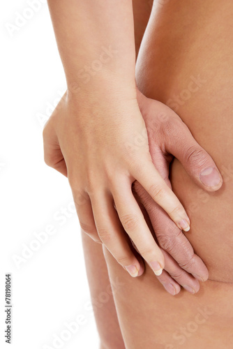 Man touching naked woman's ass. © Piotr Marcinski