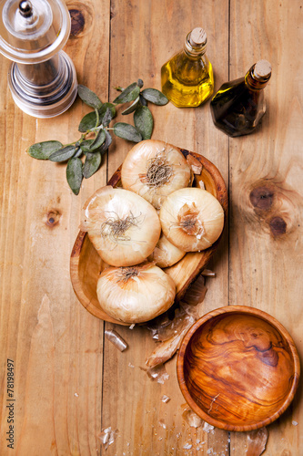 onions on wooden background. cooking ingredients