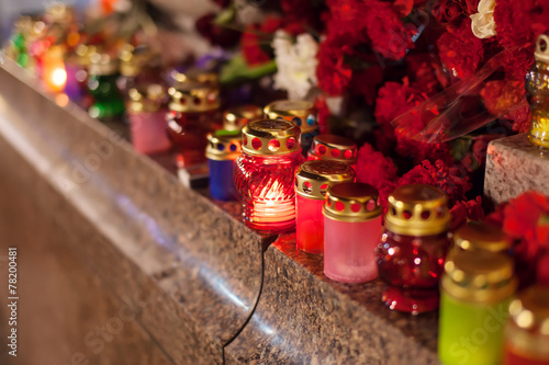 Yahrzeit candles and flowers at the Independence Square in Kiev photo