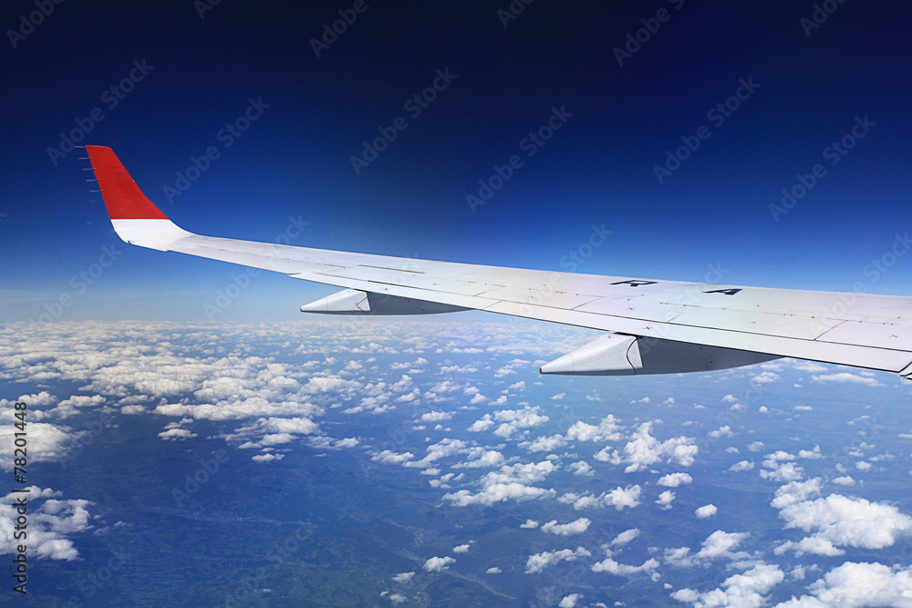 Obraz premium view from the airplane, wings sky