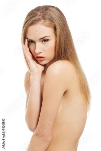 Portrait of serious nude woman © Piotr Marcinski