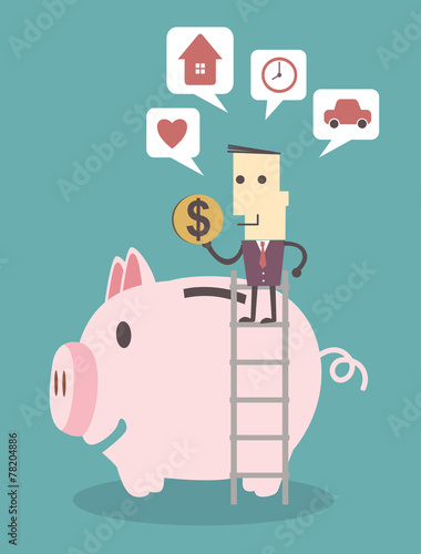 Businessman saving money in a piggy bank