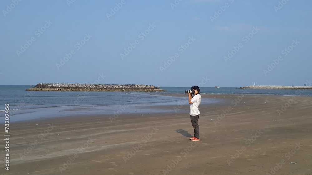 Photographer take photos at huahin beach Thailand Photographer take photos at huahin beach Thailand